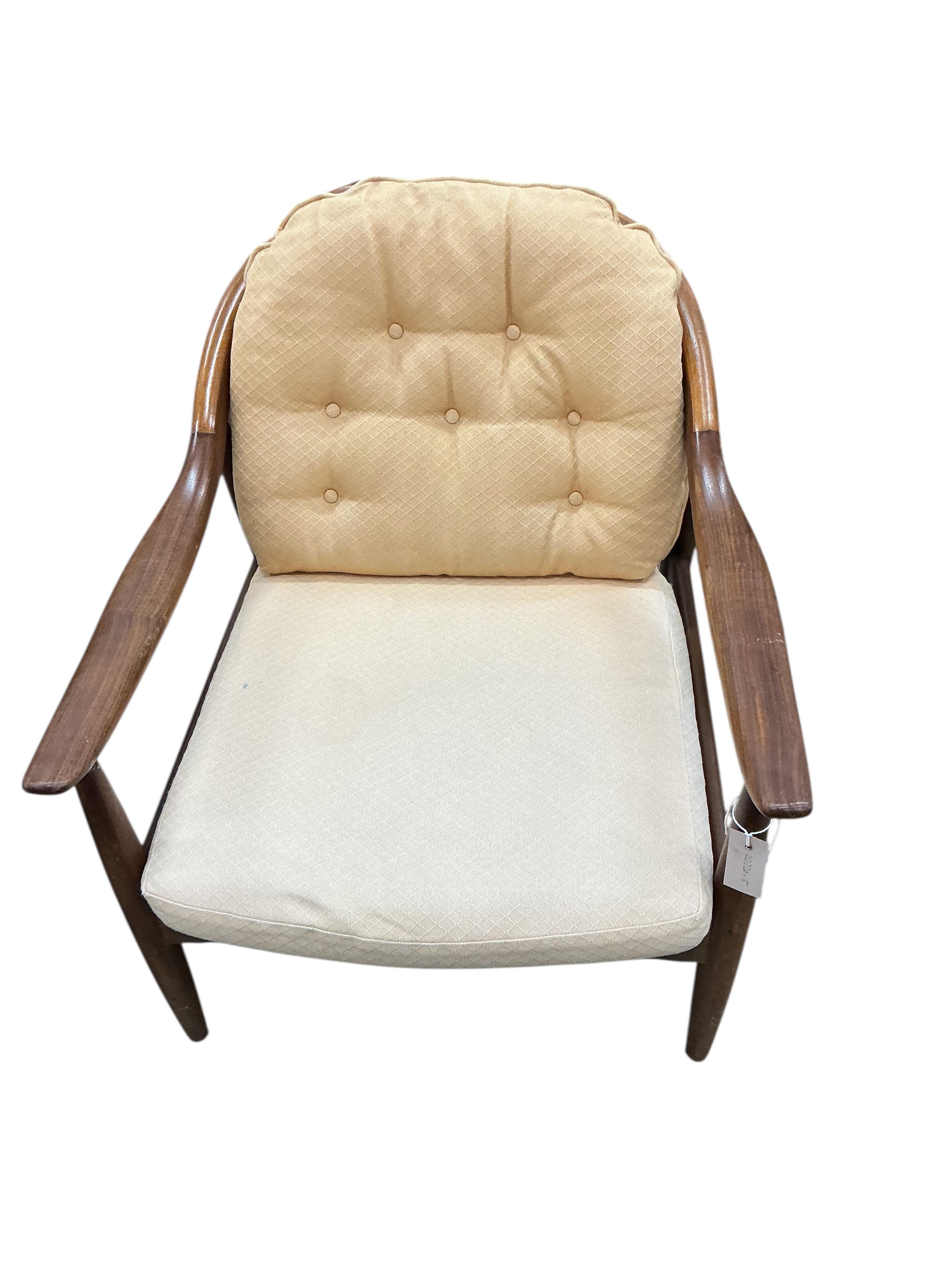 Greaves and Thomas: A pair of mid century teak armchairs, width 62cm, depth 70cm, height 70cm